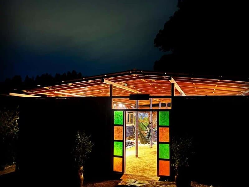 Entrance to the medicine house illuminated at night